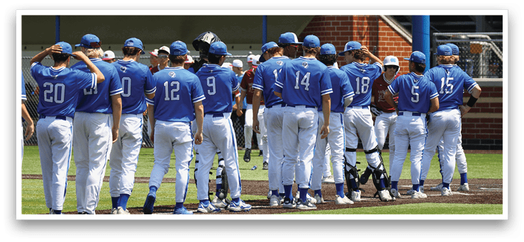 Baseball players wearing blue uniforms. Description generated by AI