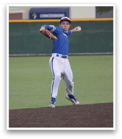 A baseball player wearing a blue shirt and white pants catching a ball. Description generated by AI