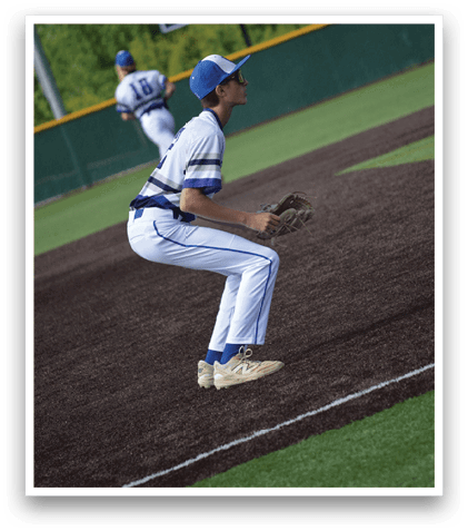 A baseball player is diving for a ball. Description generated by AI