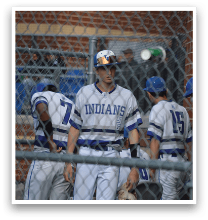 A baseball player wearing a blue helmet. Description generated by AI