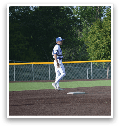 A baseball player is running on the field. Description generated by AI