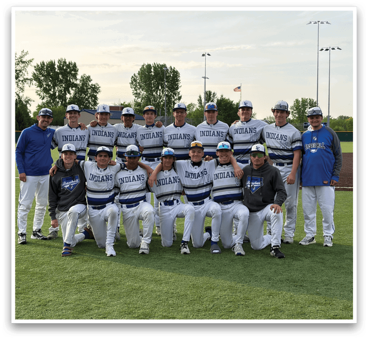A group of baseball players posing for a picture. Description generated by AI