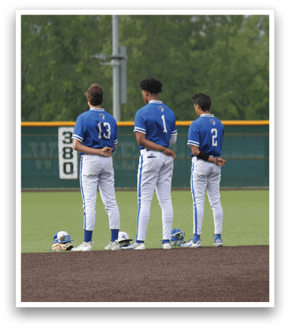 Three baseball players standing on a field. Description generated by AI