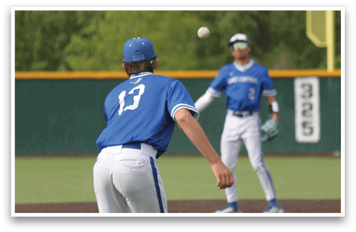 A baseball player is sliding into a base. Description generated by AI