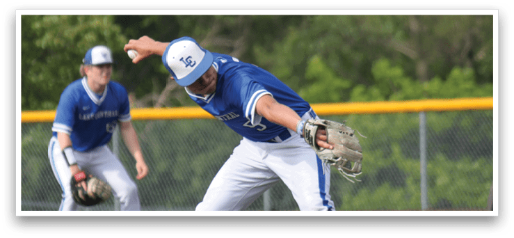 A baseball player in a blue and white uniform is throwing a ball. Description generated by AI