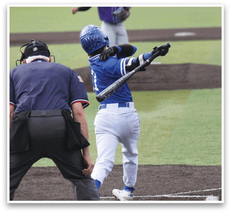A baseball player is swinging a bat. Description generated by AI