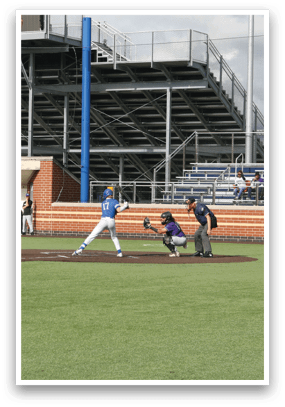 A baseball game is taking place on a field with a batter, catcher, and umpire. Description generated by AI