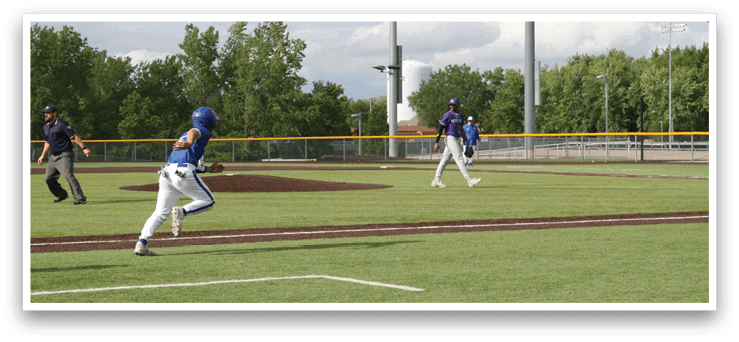 A baseball player running to first base. Description generated by AI