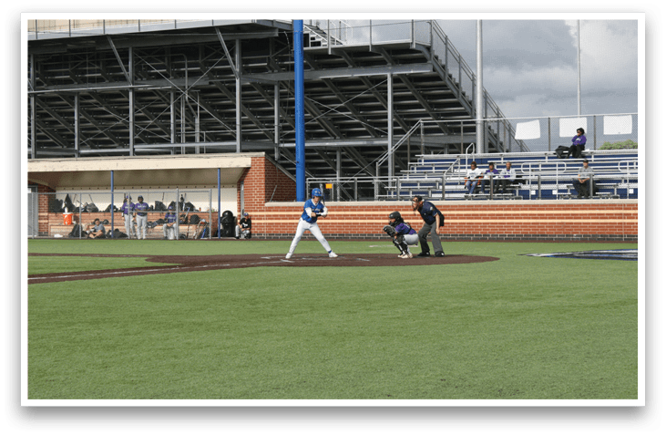 A baseball game is taking place in a stadium. Description generated by AI