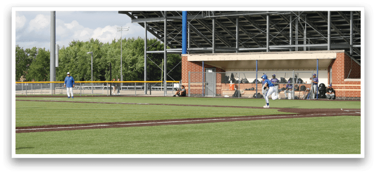 A baseball game is taking place on a field. Description generated by AI