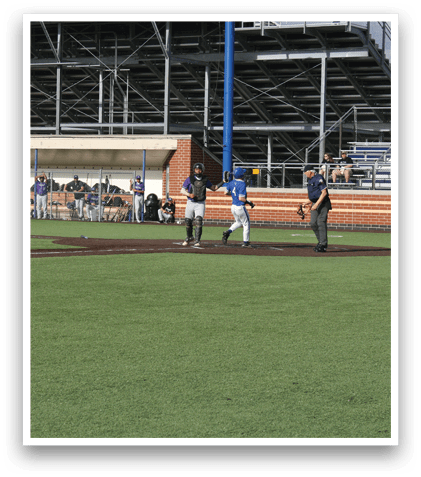 A baseball game is taking place on a field. Description generated by AI