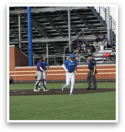 A baseball game is taking place in a stadium. Description generated by AI