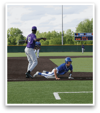 A baseball player sliding into home base. Description generated by AI