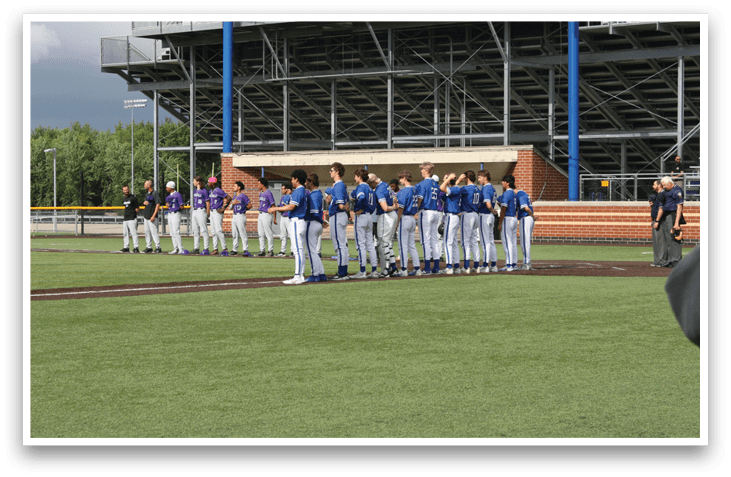 Baseball players on a field. Description generated by AI