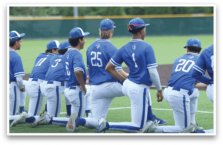 Baseball players wearing blue uniforms. Description generated by AI