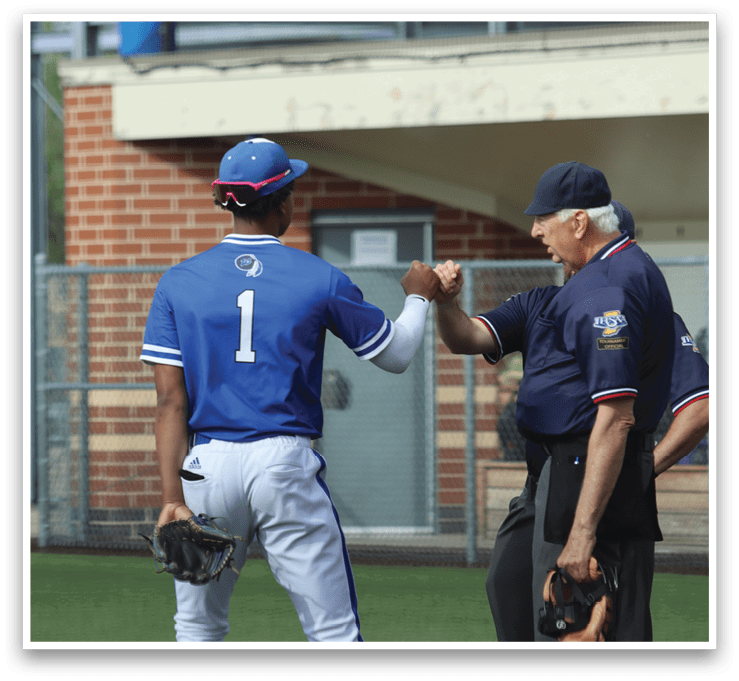 Two men shaking hands. Description generated by AI