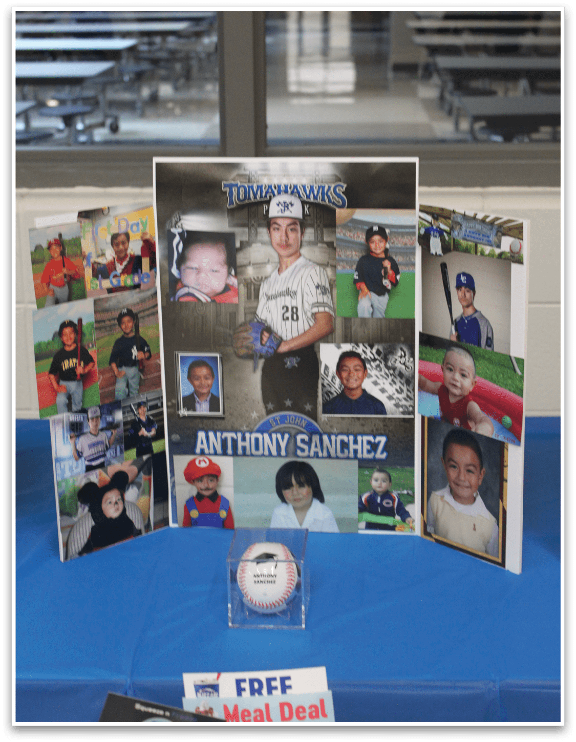 A blue table with a baseball on top. Description generated by AI