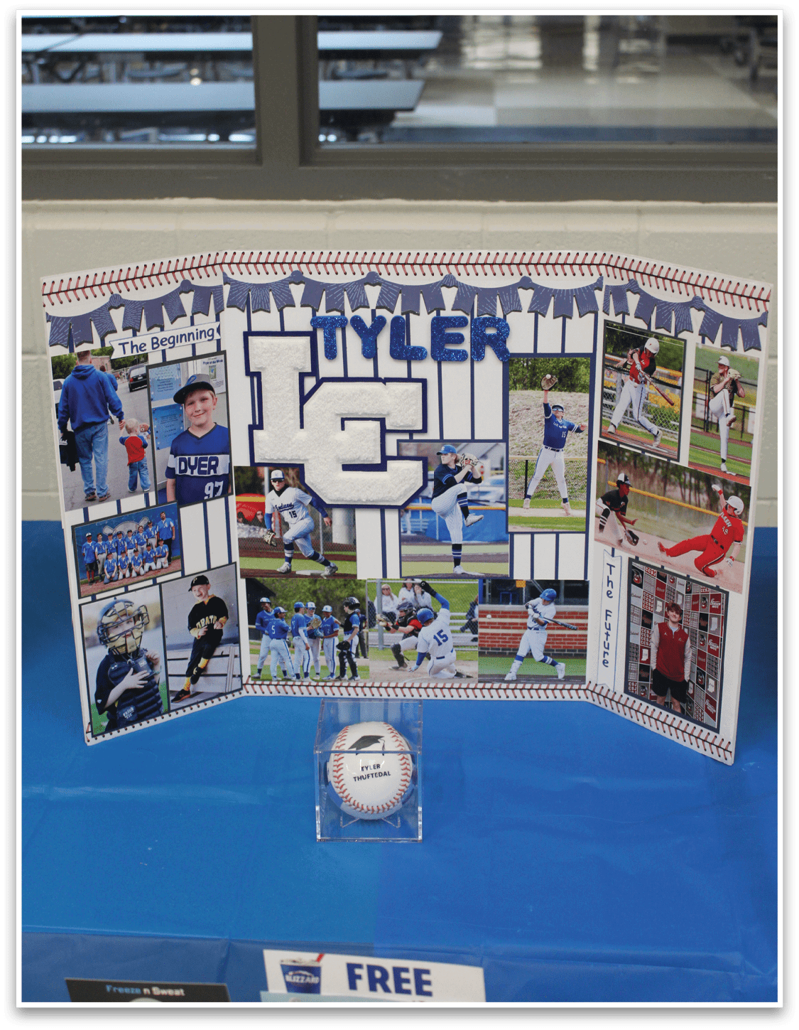 A baseball display with a baseball glove and a baseball. Description generated by AI