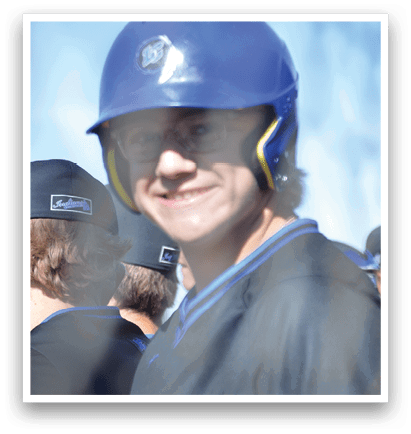 A man wearing a blue helmet and a black shirt. Description generated by AI