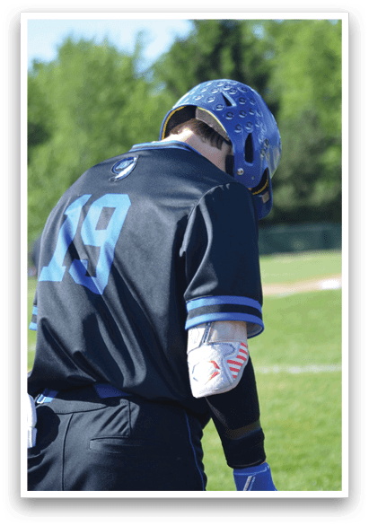 A baseball player wearing a black shirt with the number 19 on it. Description generated by AI
