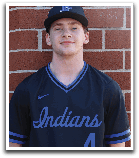 A man wearing a blue and black baseball jersey. Description generated by AI