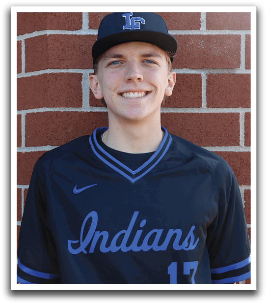 A young man wearing a blue and black baseball jersey with the number 11 on it. Description generated by AI
