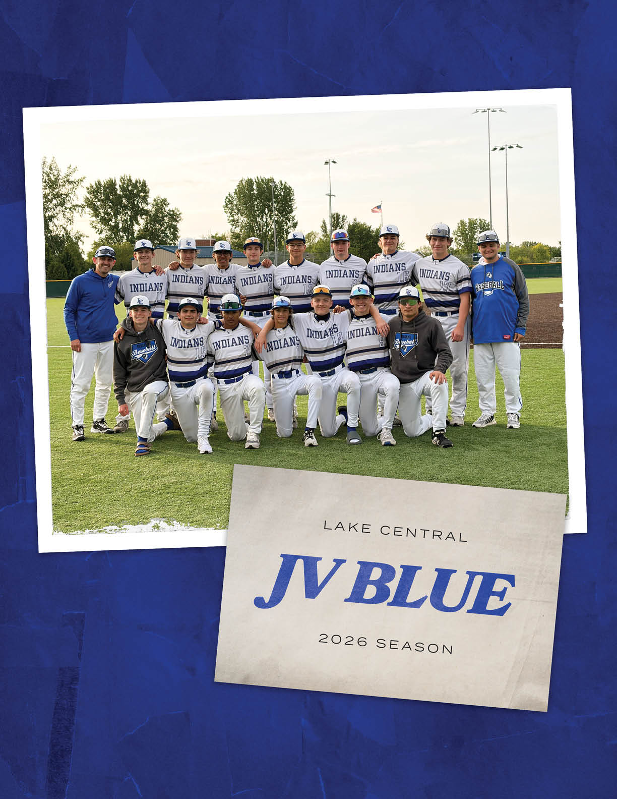 A group of people in a baseball uniform posing for a picture. Description generated by AI