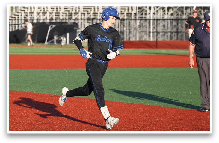 A baseball player running on the field. Description generated by AI