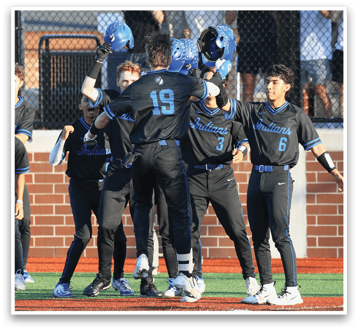 A group of baseball players celebrating on the field. Description generated by AI