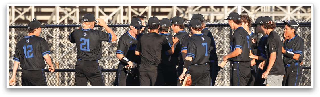 A group of baseball players wearing black uniforms. Description generated by AI