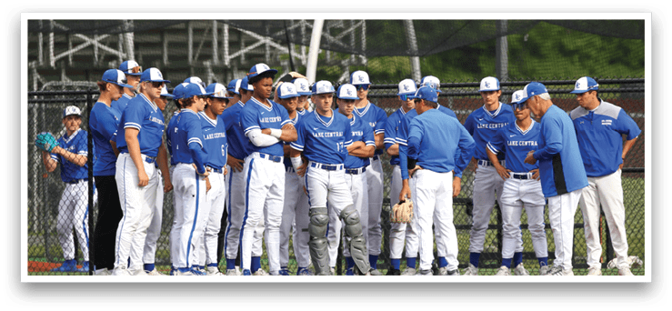 A group of baseball players wearing blue uniforms. Description generated by AI