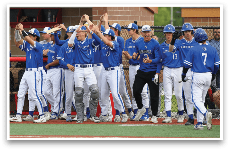 Baseball players celebrating on the field. Description generated by AI