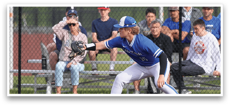 A baseball player wearing a blue shirt and white pants is running to a base. Description generated by AI