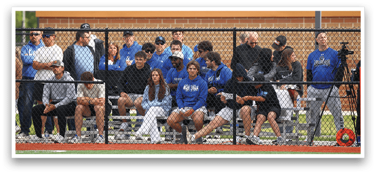 A group of people are sitting on a bench. Description generated by AI