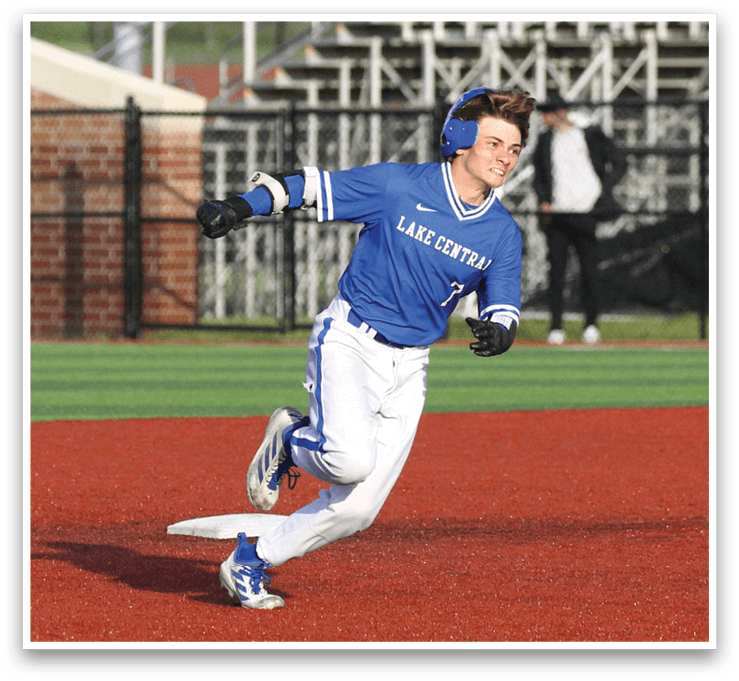 A baseball player running on the field. Description generated by AI