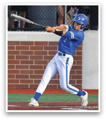 A baseball player in a blue and white uniform is swinging a bat. Description generated by AI