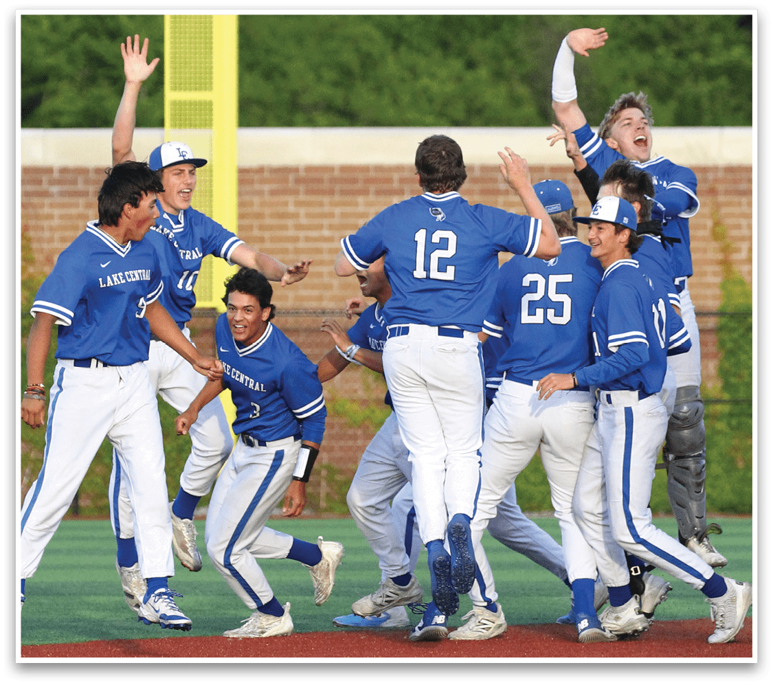 A group of baseball players celebrating on the field. Description generated by AI