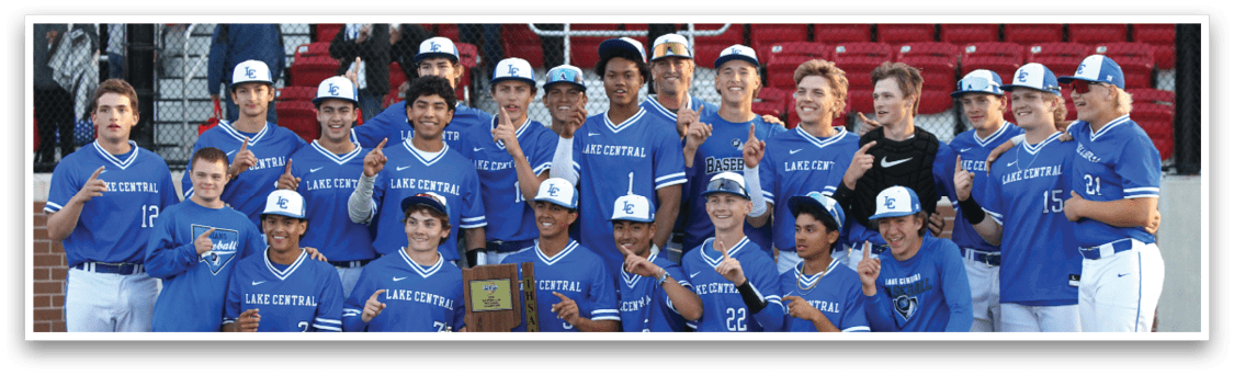 A group of baseball players posing for a picture. Description generated by AI