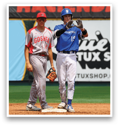 Two baseball players on a field. Description generated by AI