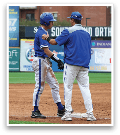 A baseball game is taking place with a group of men on the field. Description generated by AI