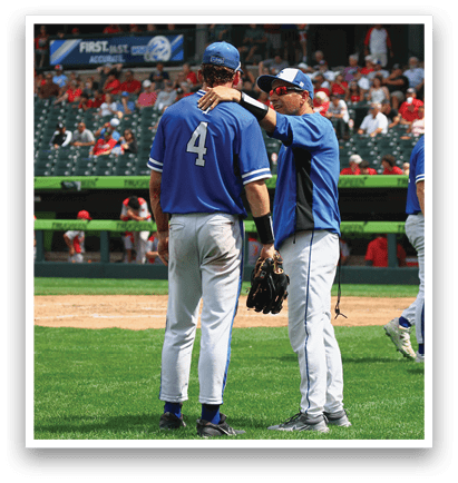 A baseball player wearing a blue shirt and white pants. Description generated by AI