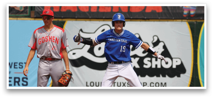 A baseball player wearing a blue and white uniform is running towards a base. Description generated by AI