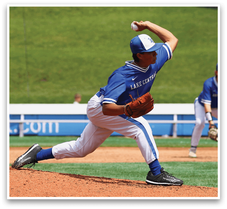 A baseball player in a blue uniform is pitching a ball. Description generated by AI