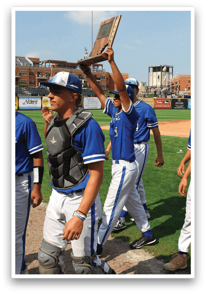 Baseball players wearing blue uniforms. Description generated by AI
