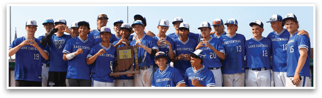 A group of baseball players in blue uniforms. Description generated by AI