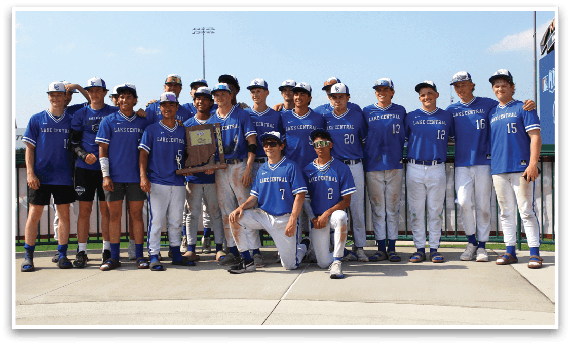 A group of baseball players posing for a photo. Description generated by AI