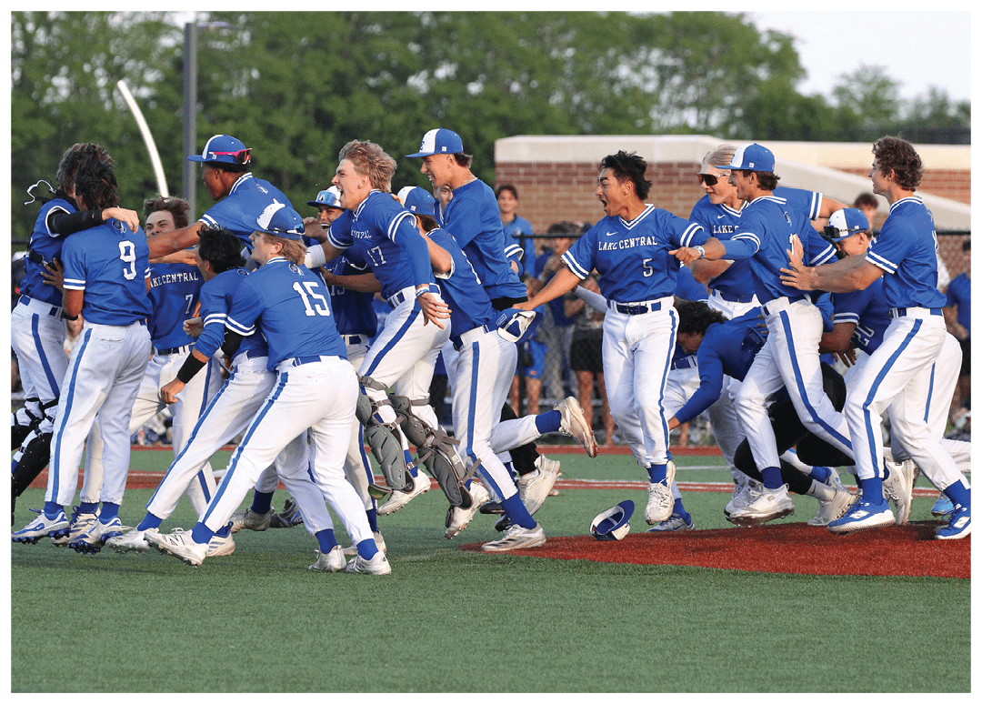 A group of baseball players celebrating on the field. Description generated by AI