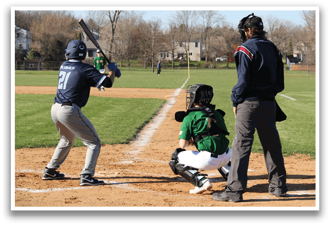 A baseball game is in progress with a batter, catcher, and umpire on the field. The batter is holding a bat and preparing to swing, while the catcher is ready to catch the ball. The umpire is standing behind the catcher, observing the play. AI generated content