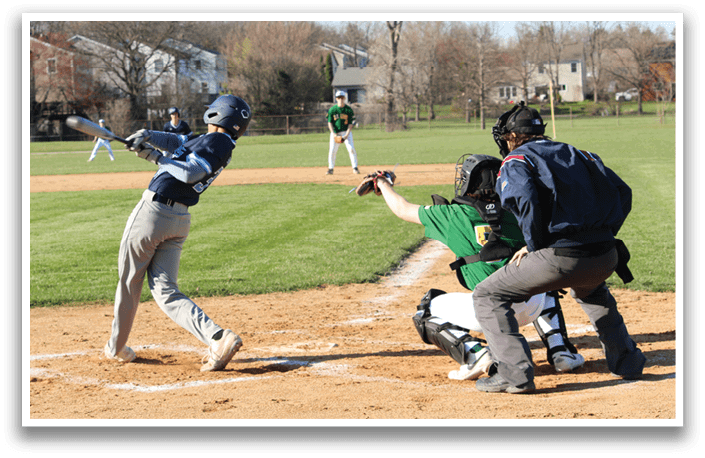 A baseball player is swinging a bat at a ball during a game. AI generated content