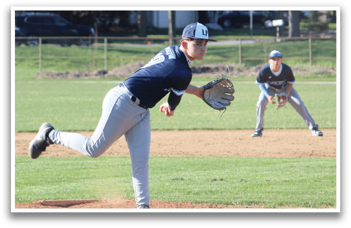 A baseball player in a blue shirt and grey pants is pitching a ball on a field. AI generated content